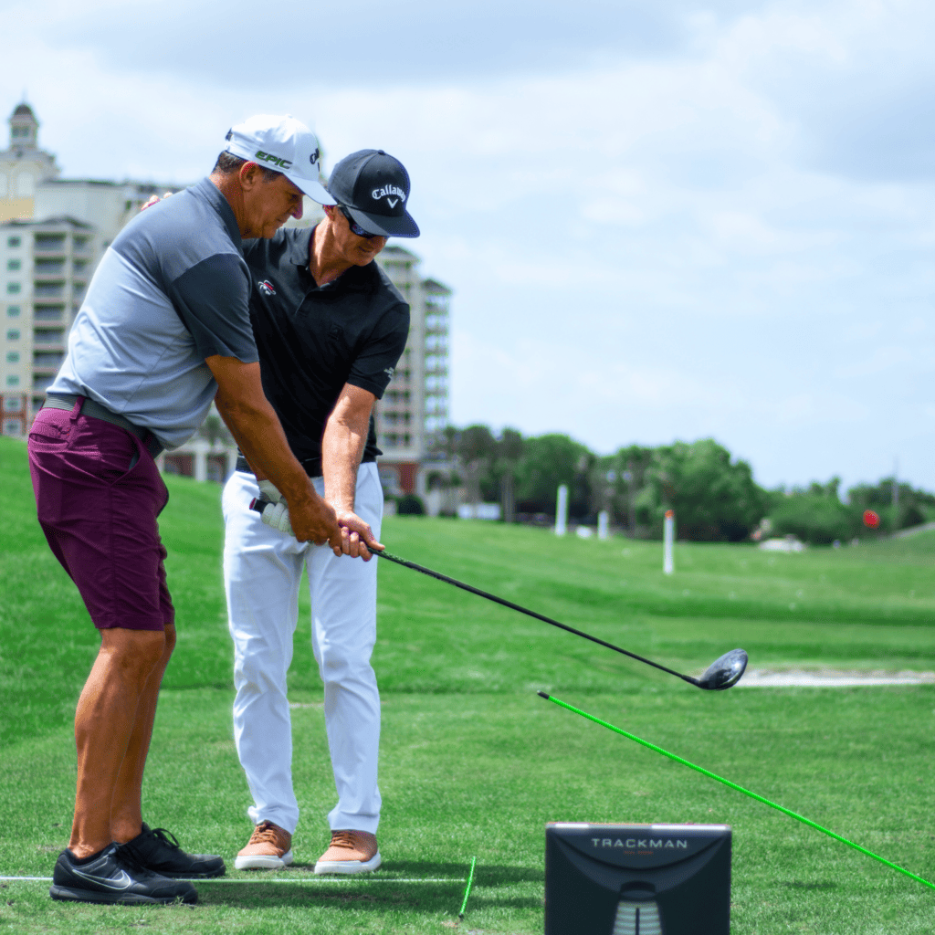 Sean Hogan gives a golf lesson at our world HQ