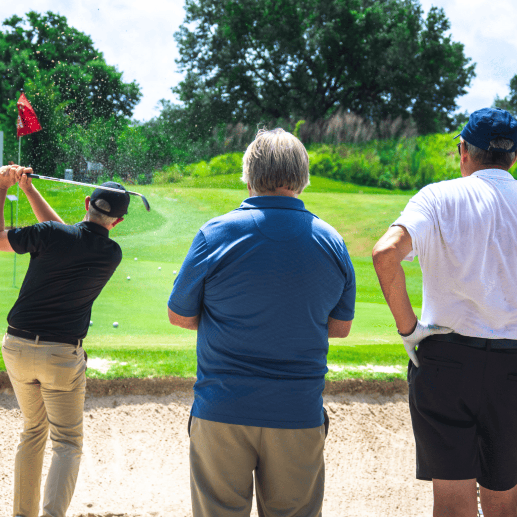 One of our expert golf instructors giving a lesson during one of our orlando corporate events